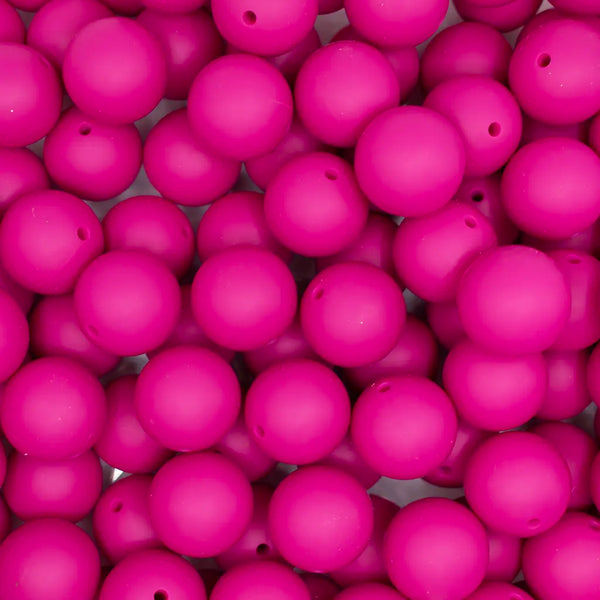 top view of a pile of 19mm Hot Pink Round Silicone Bead