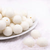 front view of a pile of 19mm Ivory Sugar Bubblegum Beads