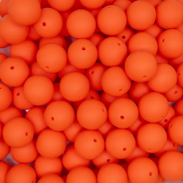 top view of a pile of 19mm Orange Round Silicone Bead\