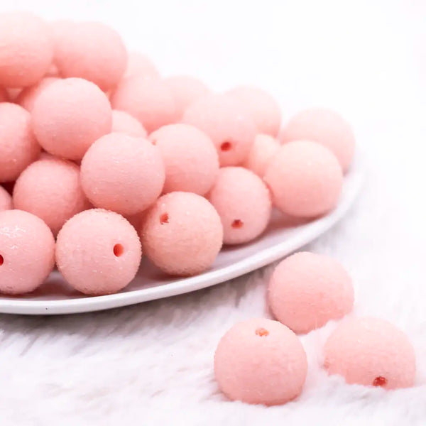 front view of a pile of 19mm Peach Sugar Bubblegum Beads
