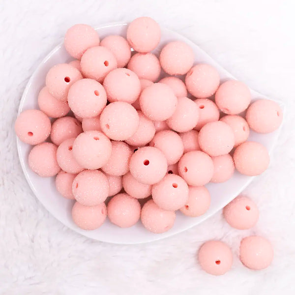 top view of a pile of 19mm Peach Sugar Bubblegum Beads