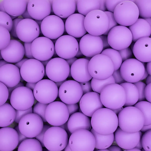 top view of a pile of 19mm Purple  Round Silicone Bead
