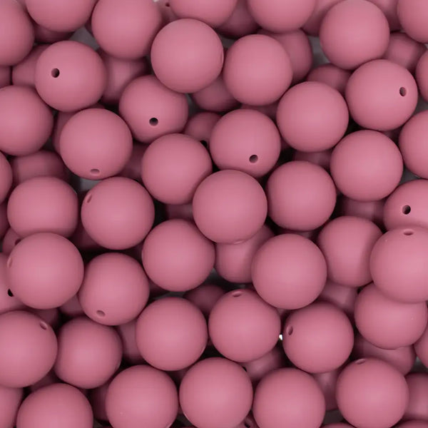 top view of a pile of 19mm Rose Pink Round Silicone Bead