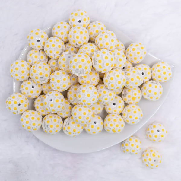 top view of a pile of 19mm White Daisy Flower luxury bead