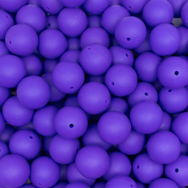 top view of a pile of 19mm Deep Purple  Round Silicone Bead