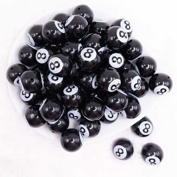 top view of a pile of 20mm 8 Ball Print Acrylic Bubblegum Beads