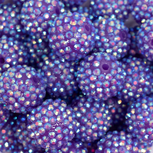 Close up view of a pile of 20mm Amethyst Purple Rhinestone AB Chunky Bubblegum Beads
