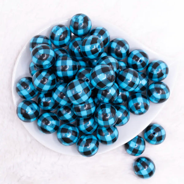 top view of a pile of 20mm Blue and Black Plaid Print Bubblegum Beads