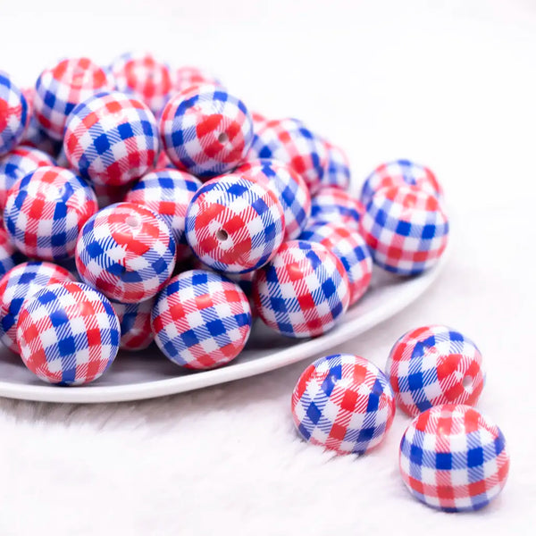front view of a pile of 20mm Red and Blue Plaid Bubblegum Beads