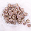 top view of a pile of 20mm Champagne Gold Berry Rhinestone Bubblegum Beads