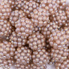 close up view of a pile of 20mm Champagne Gold Berry Rhinestone Bubblegum Beads