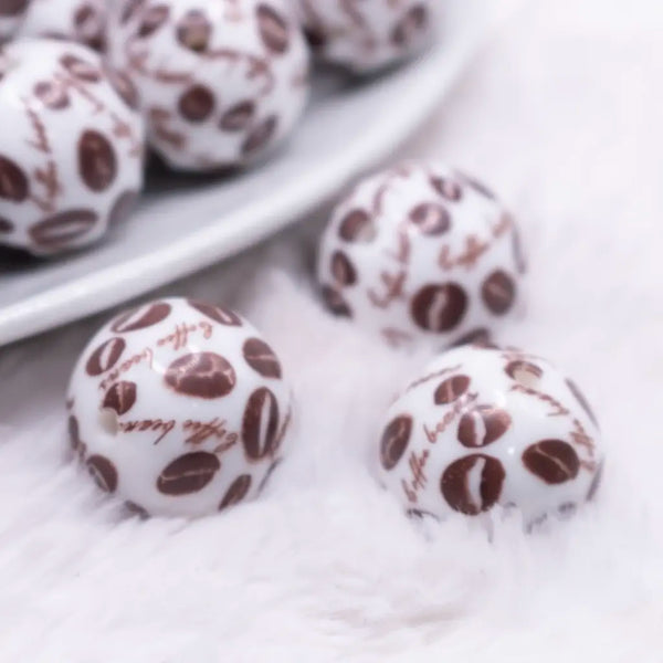 macro view of a pile of 20mm Coffee Bean Print on White Acrylic Bubblegum Beads