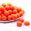 front view of a pile of 20mm Dark Orange Solid Acrylic Bubblegum Beads