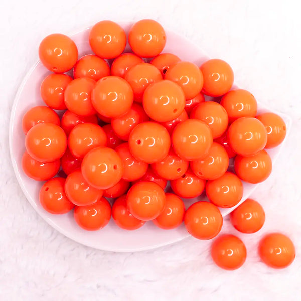 top view of a pile of 20mm Dark Orange Solid Acrylic Bubblegum Beads