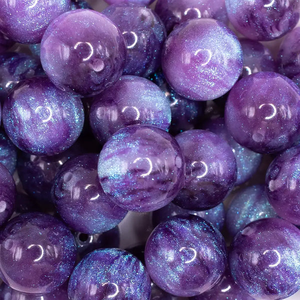 close up view of a pile of 20mm Dark Purple Opalescence Bubblegum Bead