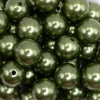 close up view of a pile of 20mm Fern Green Faux Pearl Bubblegum Beads