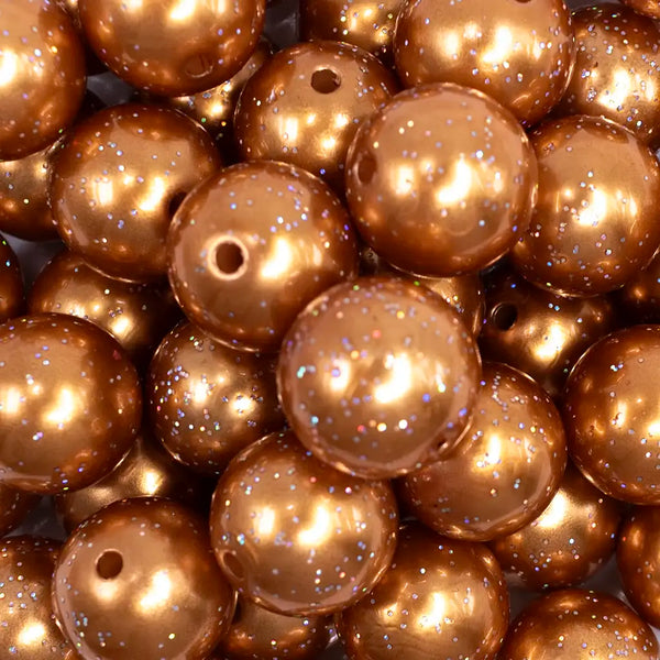 close up view of a pile of 20mm Gold with Glitter Faux Pearl Bubblegum Beads