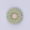 top view of a green 20mm Silicone Daisy Focal Beads