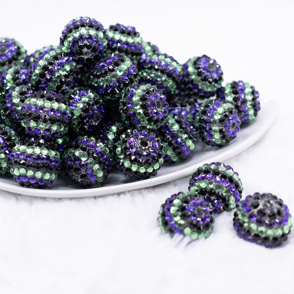 front view of a pile of 20mm Purple and Green Striped Rhinestone Bubblegum Beads