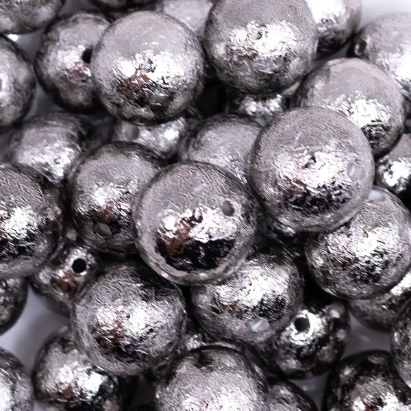 close up view of a pile of 20mm Gunmetal Crinkle Foil Bubblegum Beads