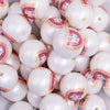 close up view of a pile of 20mm Happy Easter Print on White Matte Acrylic Bubblegum Beads