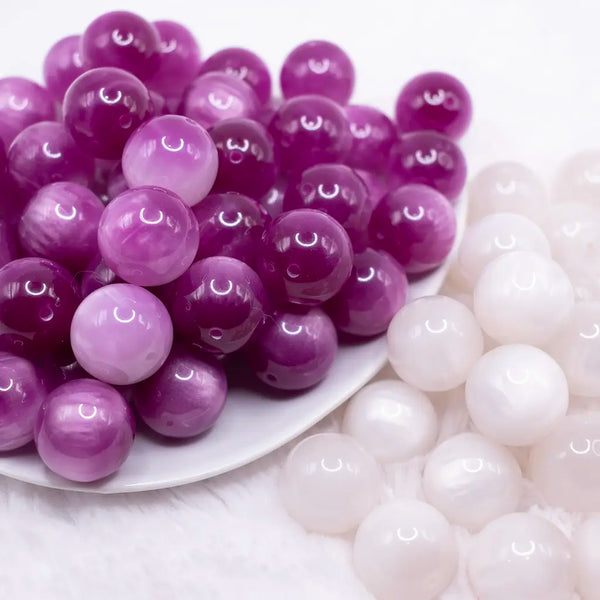 side by side comparison of 20mm Pink to Purple Color Changing Bubblegum Beads