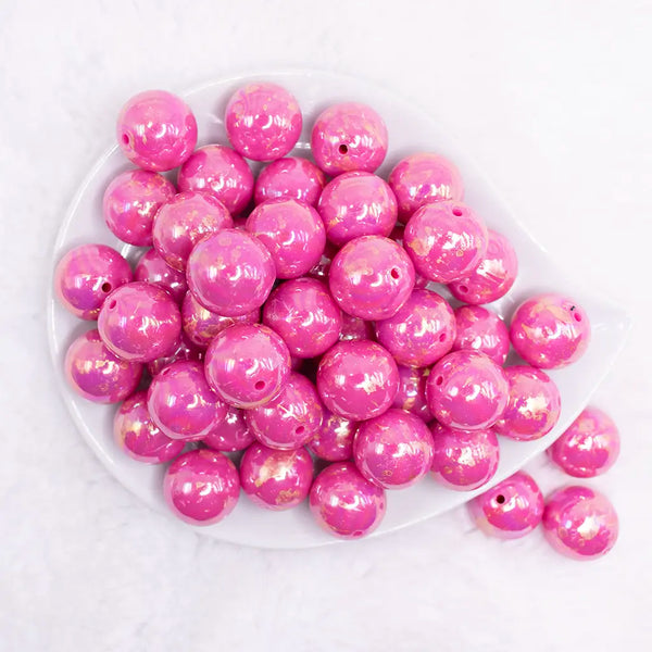 top view of a pile of 20MM Hot Pink with Gold Foil AB Bubblegum Beads