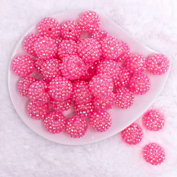 top view of a  pile of 20mm Bright Pink Rhinestone AB Bubblegum Beads