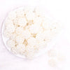 top view of a pile of 20mm Ivory Berry Rhinestone Bubblegum Beads