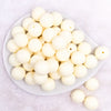 top view of a pile of 20mm Ivory Solid Bubblegum Beads