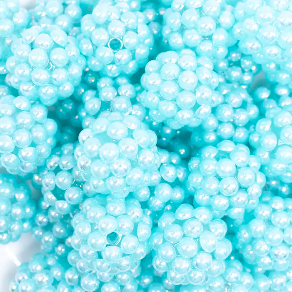Close up view of a pile of 20mm Light Blue Berry Rhinestone Bubblegum Beads