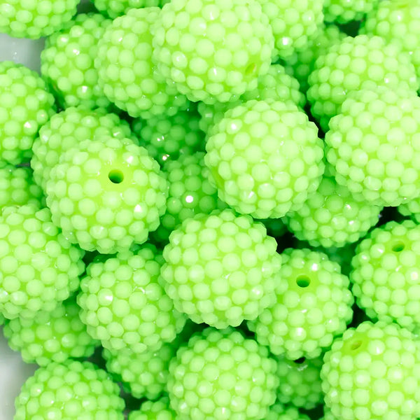 close up view of a pile of 20mm Lime Green on Lime Green Rhinestone Bubblegum Beads