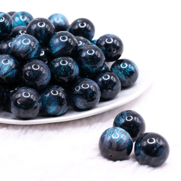 front view of a pile of 20mm Navy Blue Opalescence Bubblegum Bead