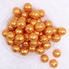 top view of a pile of 20mm Orange Disco Faceted Pearl Bubblegum Beads