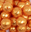 close up view of a pile of 20mm Orange Disco Faceted Pearl Bubblegum Beads