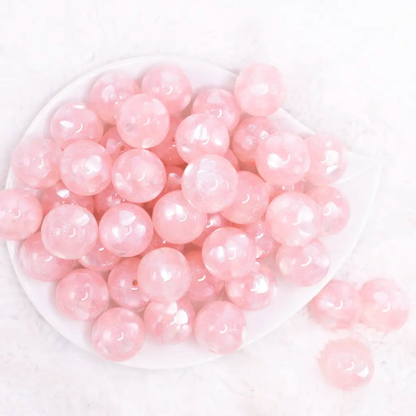 top view of a pile of 20mm Pink Heart Glitter Shimmer Bubblegum Bead