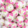 close up view of a pile of 20mm Pink and Green Floral Print Bubblegum Beads
