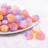 front view of a pile of 20mm Pink Opal Flower Shaped Acrylic Beads