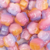 close up view of a pile of 20mm Pink Opal Flower Shaped Acrylic Beads