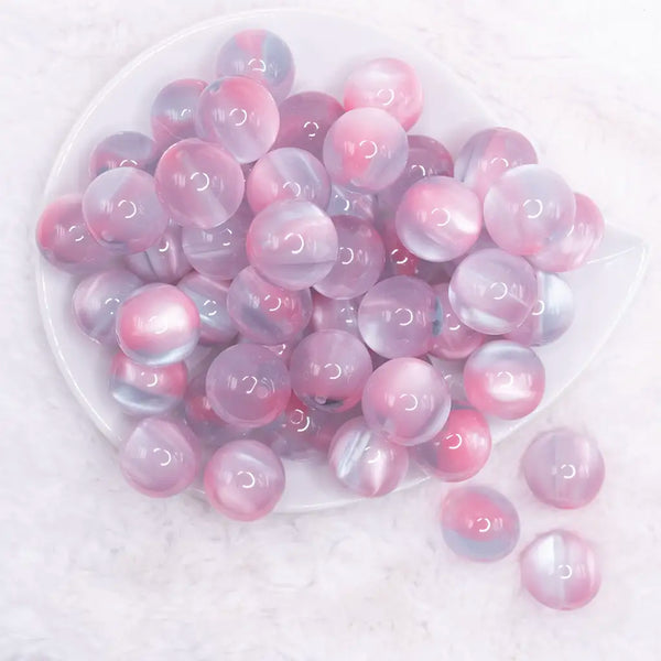 top view of a pile of 20mm Pink Illusion Glitter Bubblegum Bead