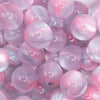 close up view of a pile of 20mm Pink Illusion Glitter Bubblegum Bead