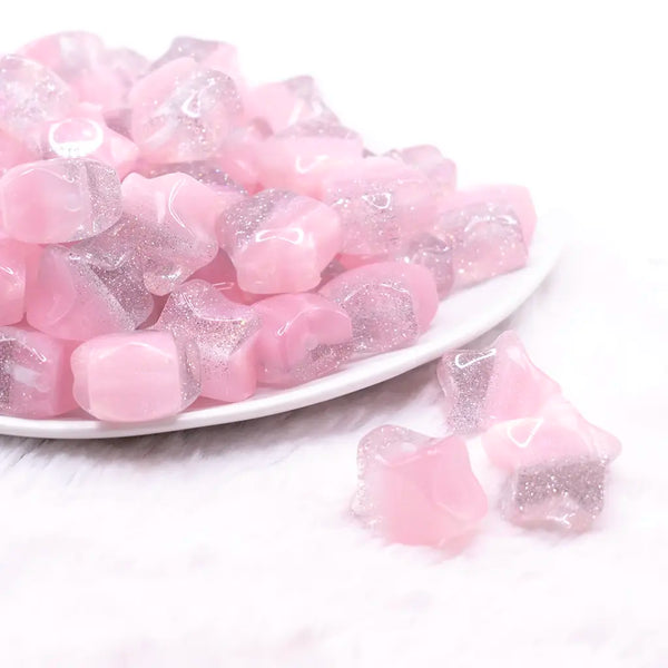 front view of a pile of 20mm Pink Opal Star Shaped Acrylic Beads