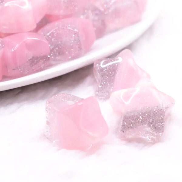 macro view of a pile of 20mm Pink Opal Star Shaped Acrylic Beads