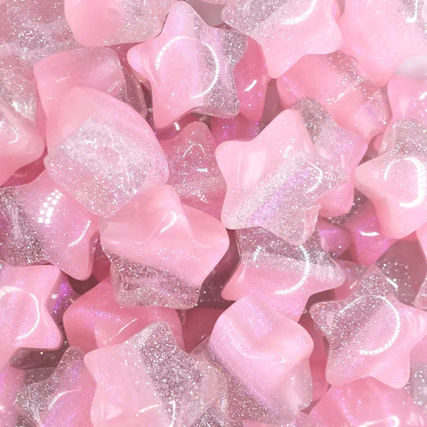 close up view of a pile of 20mm Pink Opal Star Shaped Acrylic Beads