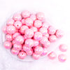top view of a pile of 20MM Pink with Gold Foil Splatter AB Bubblegum Beads