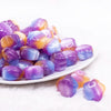 front view of a pile of 20mm Purple Opal Flower Shaped Acrylic Beads