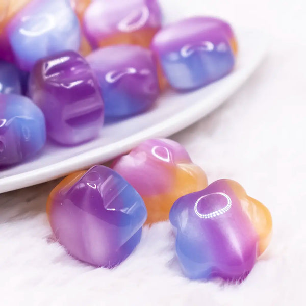 macro view of a pile of 20mm Purple Opal Flower Shaped Acrylic Beads