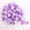 top view of a pile of 20mm Purple Opal Heart Shaped Acrylic Beads