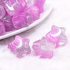 Macro view of a pile of 20mm Purple Opal Star Shaped Acrylic Beads