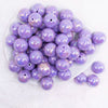 top view of a pile of 20MM Purple with Gold Foil AB Bubblegum Beads